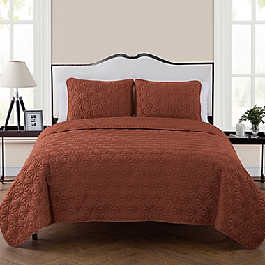VCNY Home Kaleidoscope 3-Piece Reversible Queen Quilt Set in Burnt Orange. View a larger version of this product image.