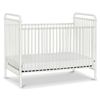 white washed baby crib