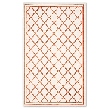 Safavieh Amherst 5-Foot x 8-Foot Quine Indoor/Outdoor Area Rug in Beige/Orange. View a larger version of this product image.