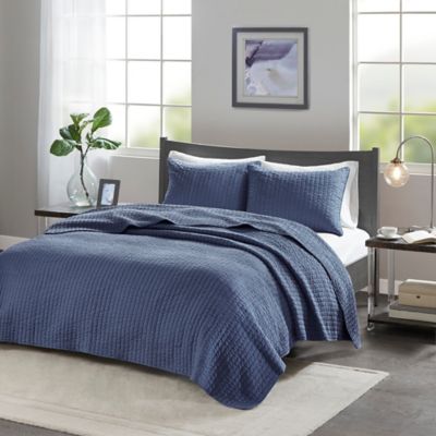 navy and white coverlet
