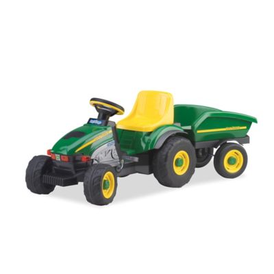 sit on toy tractor and trailer