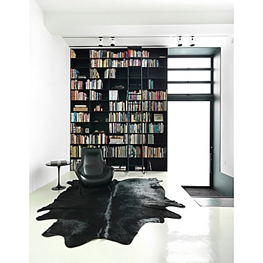 bel amore&reg; Geneva 6&#39; x 7&#39; Handcrafted Cowhide Area Rug in Black. View a larger version of this product image.
