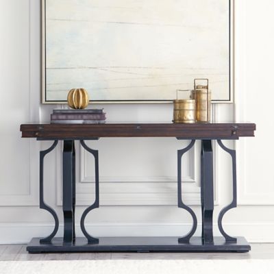 console table behind bed