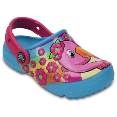 blue crocs with flamingos