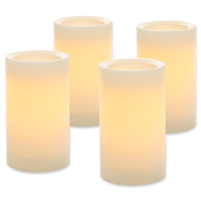 LED Flameless Wax Pillar Candles with Timer in Cream (Set of 4) Bed