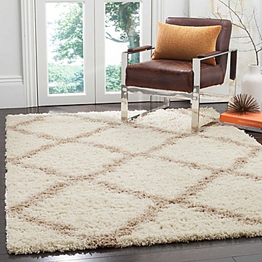 Safavieh Dallas 5-Foot 1-Inch x 7-Foot 6-Inch Shag Area Rug in Ivory/Beige. View a larger version of this product image.