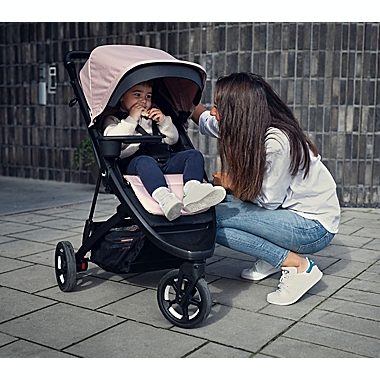 Thule&reg; Spring Stroller in Misty Rose Melange. View a larger version of this product image.