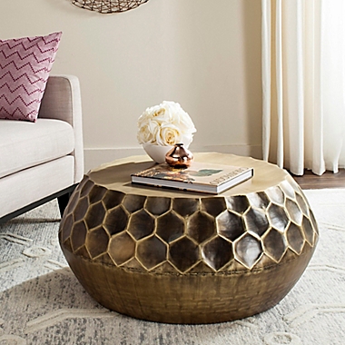 Safavieh Roxanna Coffee Table in Antique Brass. View a larger version of this product image.