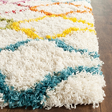 Safavieh Kids&reg; Trellis Shag Rug in Ivory/Multi. View a larger version of this product image.