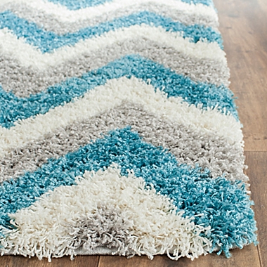 Safavieh Kids&reg; Zigzag Shag Rug in Ivory/Blue. View a larger version of this product image.