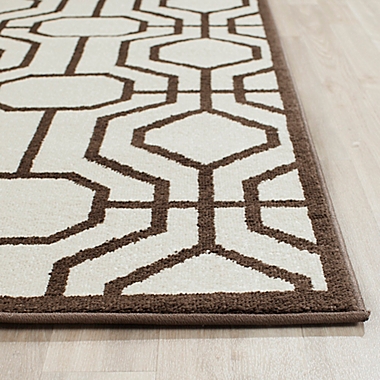 Safavieh Amherst Jillian 4-Foot x 6-Foot Indoor/Outdoor Area Rug in Ivory/Brown. View a larger version of this product image.