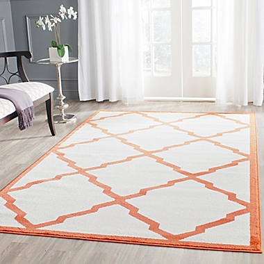 Safavieh Amherst Festival 5-Foot x 8-Foot Indoor/Outdoor Area Rug in Beige/Orange. View a larger version of this product image.