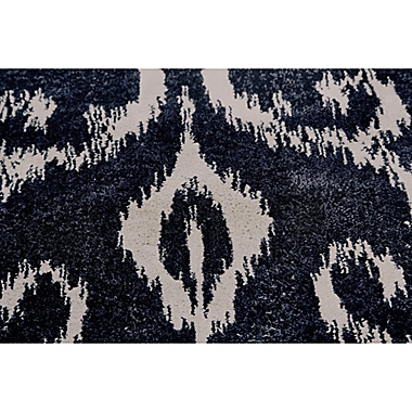 Weave & Wander Guilia Scrolling Ikat Print 2&#39;10 x 7&#39;10 Runner in Indigo/Ivory. View a larger version of this product image.