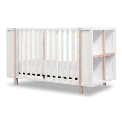 white washed baby crib