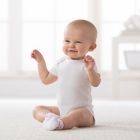 Alternate image 1 for Gerber ONESIES&reg; Brand Size 6-9M 5-Pack Short Sleeve Bodysuits in White