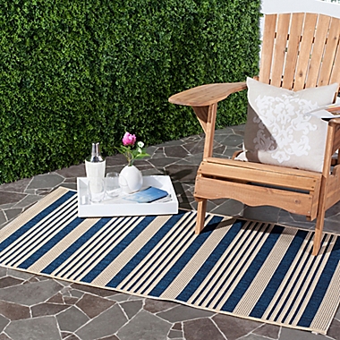 Safavieh Courtyard Stripes 2-Foot 7-Inch x 5-Foot Indoor/Outdoor Accent Rug in Navy/Beige. View a larger version of this product image.