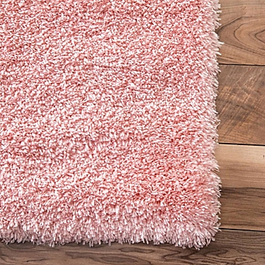 nuLOOM Gynel Cloudy Shag 5&#39;3 x 7&#39;6 Shag Area Rug in Baby Pink. View a larger version of this product image.