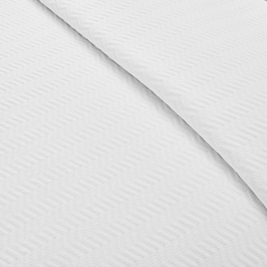 Lacoste Chevron Reversible Coverlet. View a larger version of this product image.