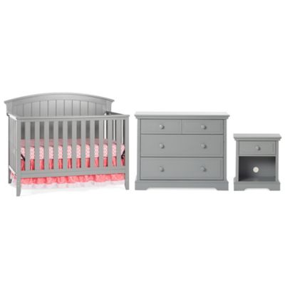 grey baby crib and dresser