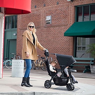 Joovy&reg; Caboose Too Ultralight Graphite Stand-On Tandem Stroller in Black. View a larger version of this product image.