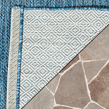 Safavieh Courtyard Amia 2&#39; x 3&#39;7 Indoor/Outdoor Accent Rug in Navy. View a larger version of this product image.