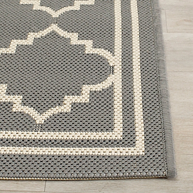 Safavieh Courtyard 8-Foot x 11-Foot Remi Indoor/Outdoor Rug in Grey/Beige. View a larger version of this product image.