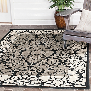Safavieh Courtyard 8-Foot x 11-Foot Amy Indoor/Outdoor Rug in Black/Sand. View a larger version of this product image.