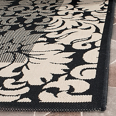 Safavieh Courtyard 8-Foot x 11-Foot Amy Indoor/Outdoor Rug in Black/Sand. View a larger version of this product image.