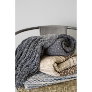 Magnolia Home by Joanna Gaines Anna Throw Blanket in Beige/Ivory. View a larger version of this product image.