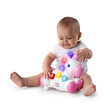Bright Starts&trade; Rock & Glow Unicorn in Pink. View a larger version of this product image.