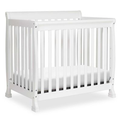 grey mini crib