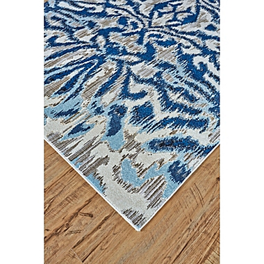 Weave & Wander Carini Abstract Ikat 5&#39;3 x 7&#39;6 Area Rug in Blue/Silver Mink. View a larger version of this product image.