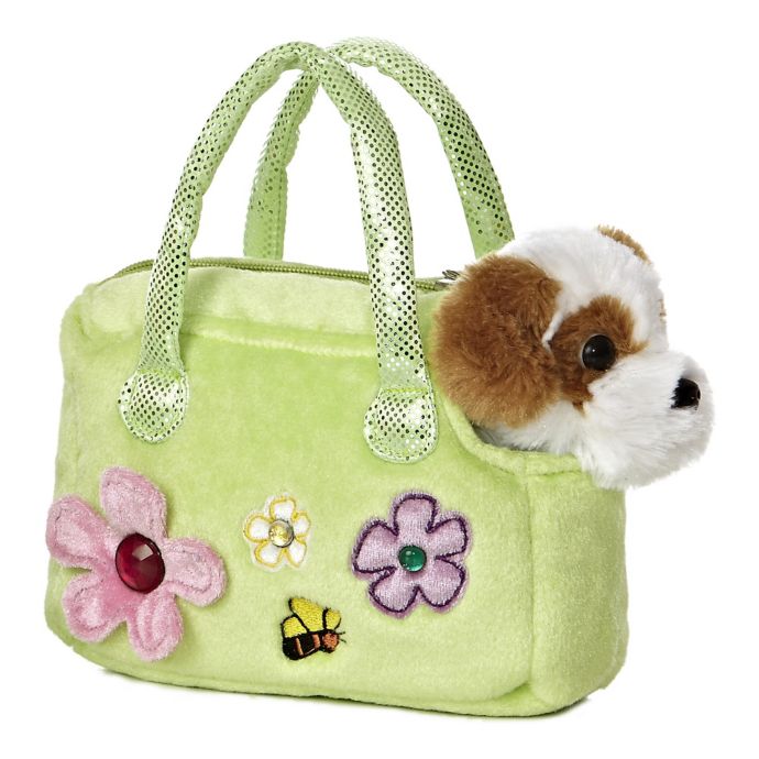 plush dog in carrier