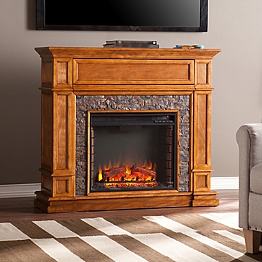 Southern Enterprises Belleview Faux Stone Electric Fireplace in Sienna. View a larger version of this product image.