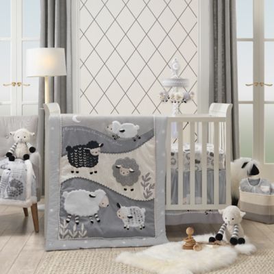 crib mattress with sheep on it