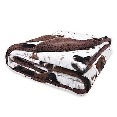 Sleeping Partners Oversized Cowhide Print Throw Blanket. View a larger version of this product image.