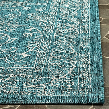Destination Summer Courtyard Indoor/Outdoor Rug in Turquoise. View a larger version of this product image.