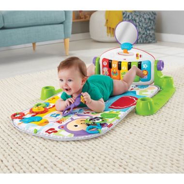 Fisher-Price&reg; Deluxe Kick and Play Piano Gym in Green. View a larger version of this product image.