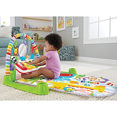 Fisher-Price&reg; Deluxe Kick and Play Piano Gym in Green. View a larger version of this product image.