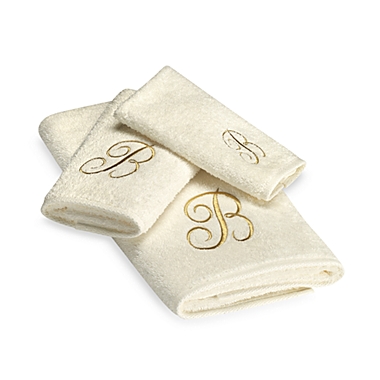 Avanti Premier Gold Script Monogram Fingertip Towel in Ivory. View a larger version of this product image.