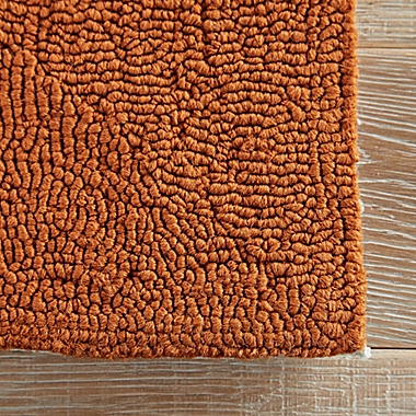 Jaipur Grant Design Bough Out 7-Foot 6-Inch x 9-Foot 6-Inch Indoor/Outdoor Rug in Orange/Grey. View a larger version of this product image.