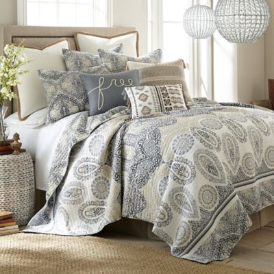 gray and tan bedding