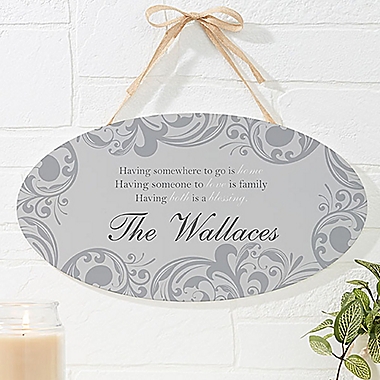 Family Blessings 15.5-Inch x 8.5-Inch Personalized Oval Wood Sign. View a larger version of this product image.