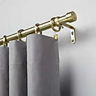 Alternate image 1 for Umbra&reg; Cappa 66 to 120-Inch Adjustable Curtain Rod in New Brass