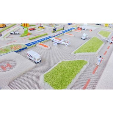 IVI Mini City 3&#39;3" x 4&#39;11" 3-Dimensional Play Rug in Blue. View a larger version of this product image.