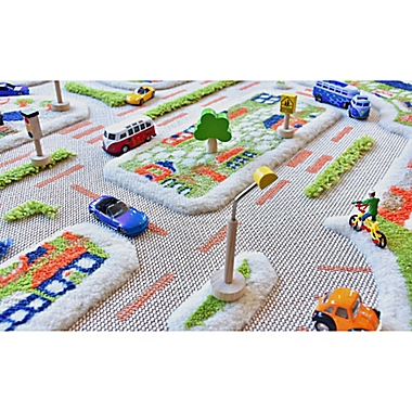 IVI Mini City 3&#39;3&quot; x 4&#39;11&quot; 3-Dimensional Play Rug in Blue. View a larger version of this product image.