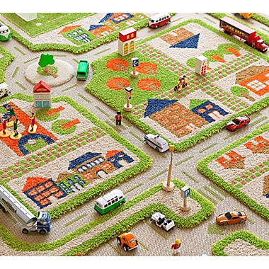 IVI Traffic 3&#39;3" x 4&#39;11" 3-Dimensional Play Rug in Green. View a larger version of this product image.