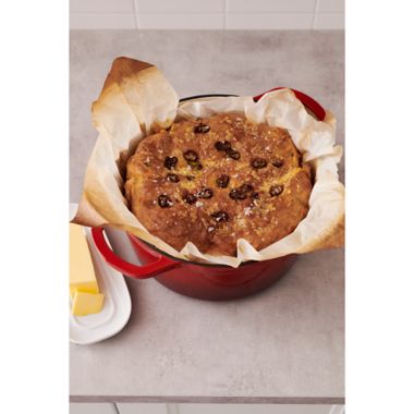 Our Table&trade; 6 qt. Enameled Cast Iron Dutch Oven with Stainless Steel Knob in Denim. View a larger version of this product image.