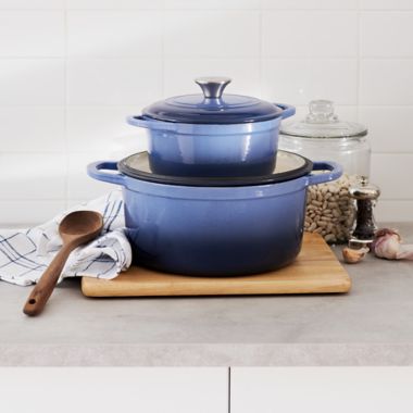 Our Table&trade; 6 qt. Enameled Cast Iron Dutch Oven with Stainless Steel Knob in Denim. View a larger version of this product image.