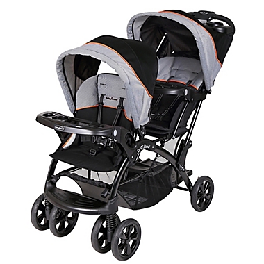 Baby Trend Sit N&#39; Stand Double Stroller in Millennium Orange. View a larger version of this product image.